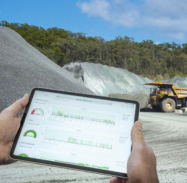 Person holding tablet with dashboard